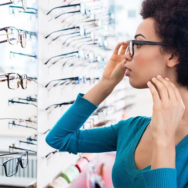 woman shopping for glasses